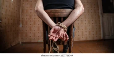 man-tied-rope-sits-on-260nw-2207726349